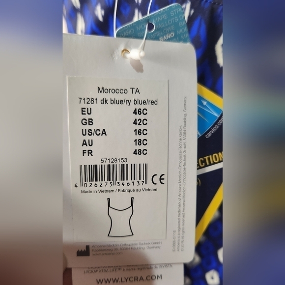 White striped bikini top on a dark blue background.  Elongated style, adjustable - Picture 5 of 6